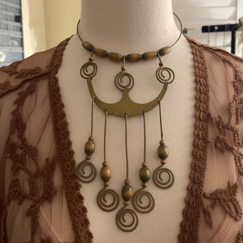 Vintage Handmaid statement piece from the 60s early 70s made of brass& wood